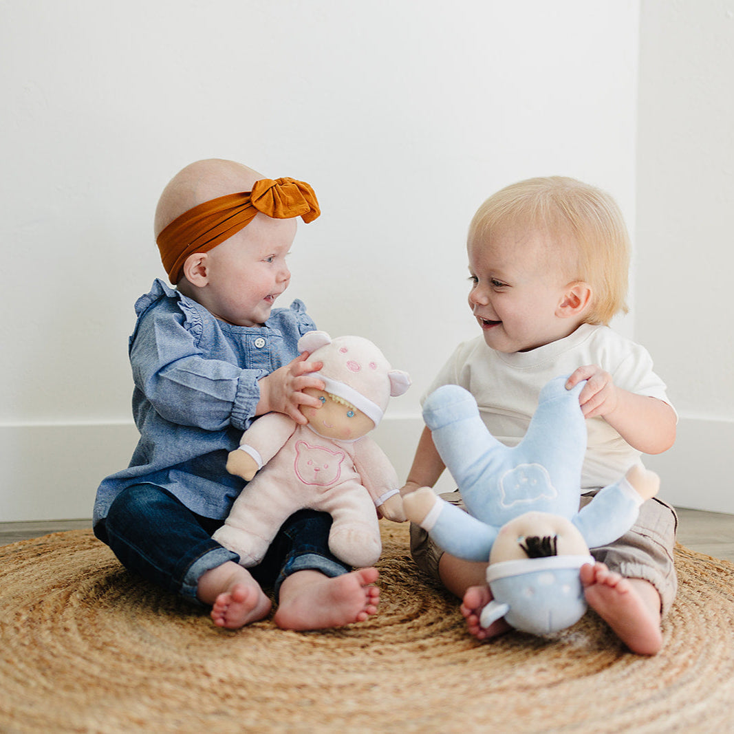 Babies playing with Plush Sleeper Dolls