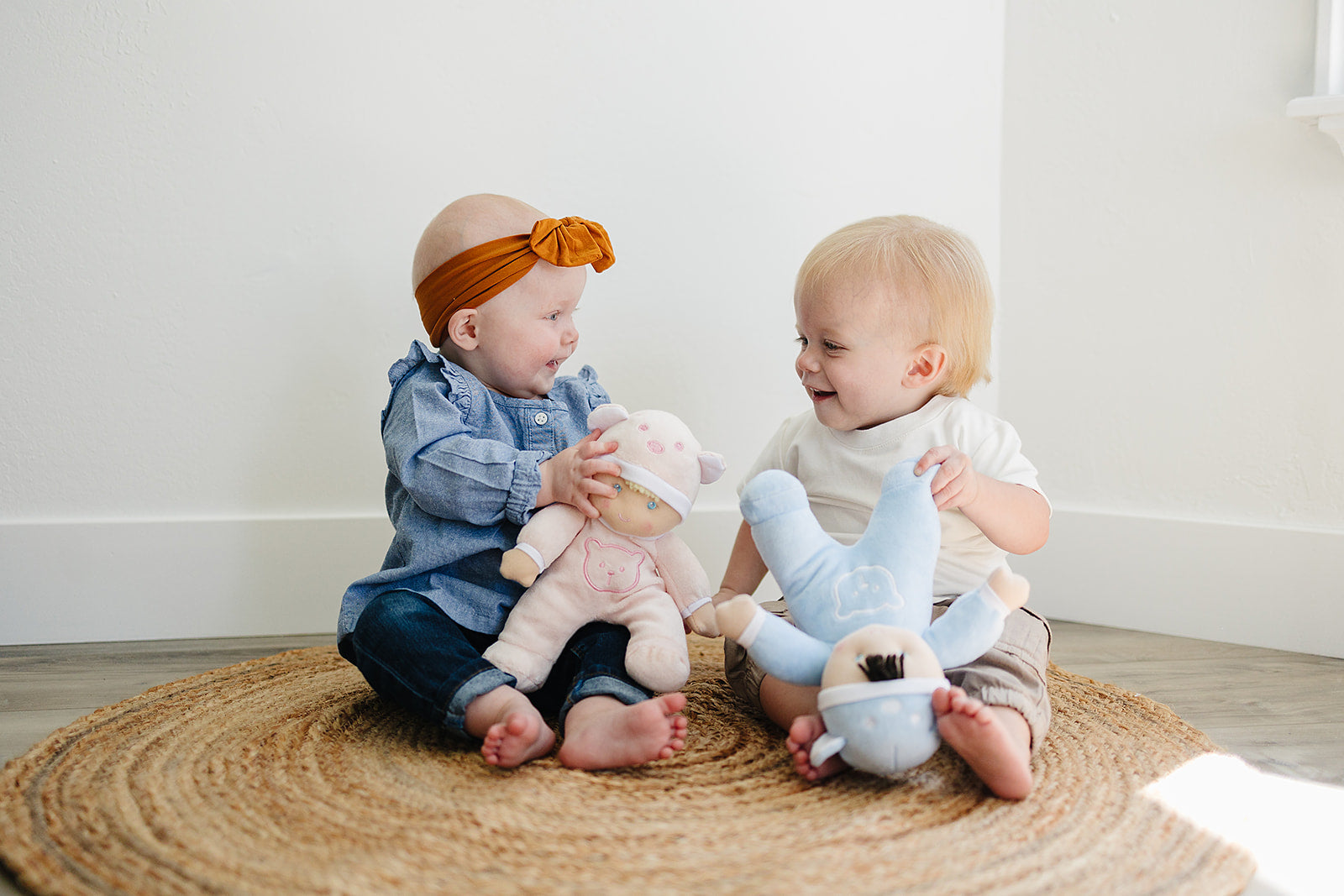 Babies playing with Plush Sleeper Dolls